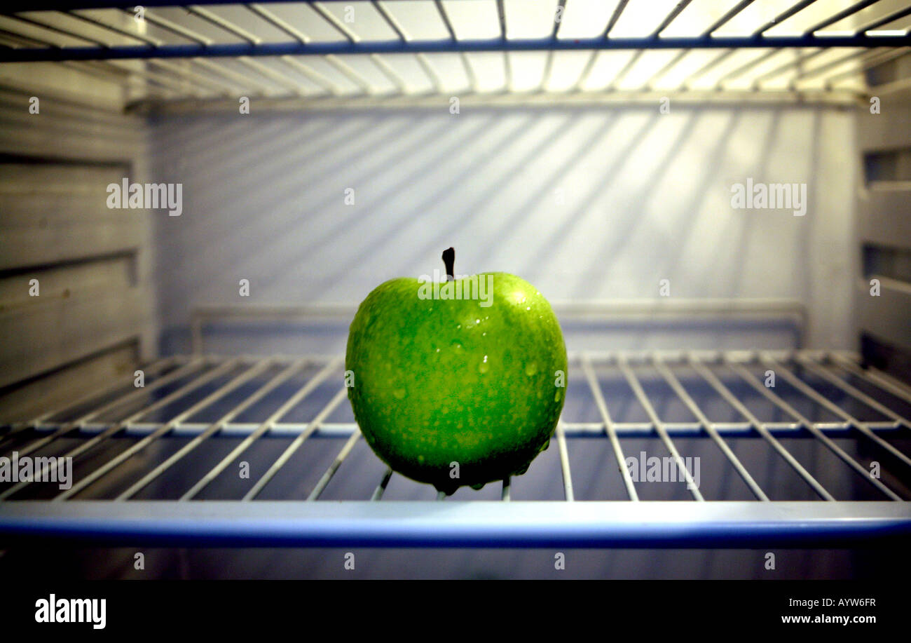 Solitary apple in fridge Stock Photo Alamy