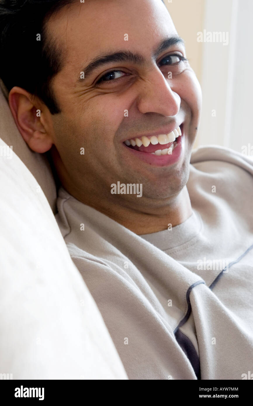 Profile of a laughing east Indian man Stock Photo - Alamy