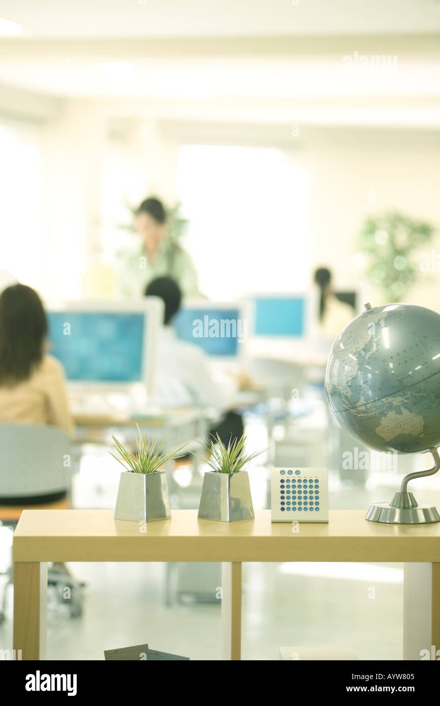 Office interior with a globe Stock Photo - Alamy
