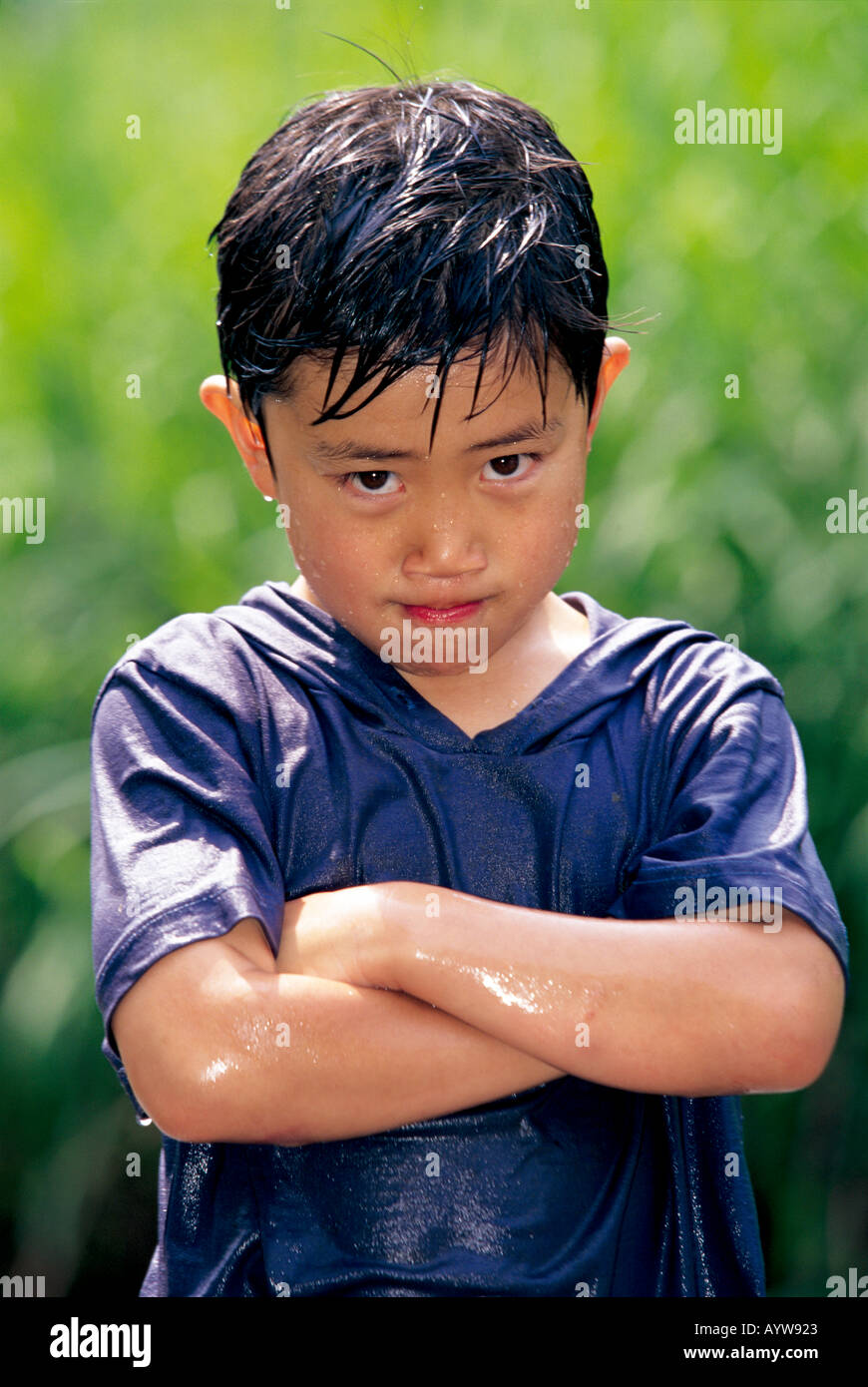 Soaking wet boy Stock Photo