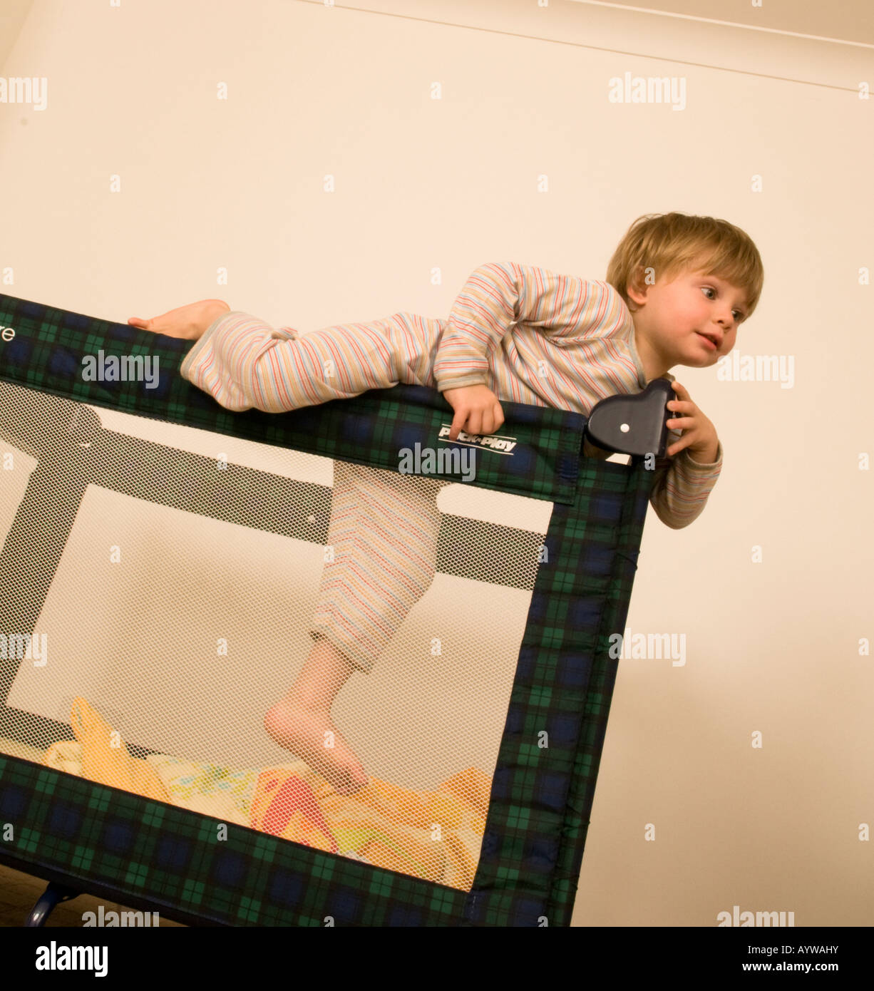 Child climbing out of bed hires stock photography and images Alamy