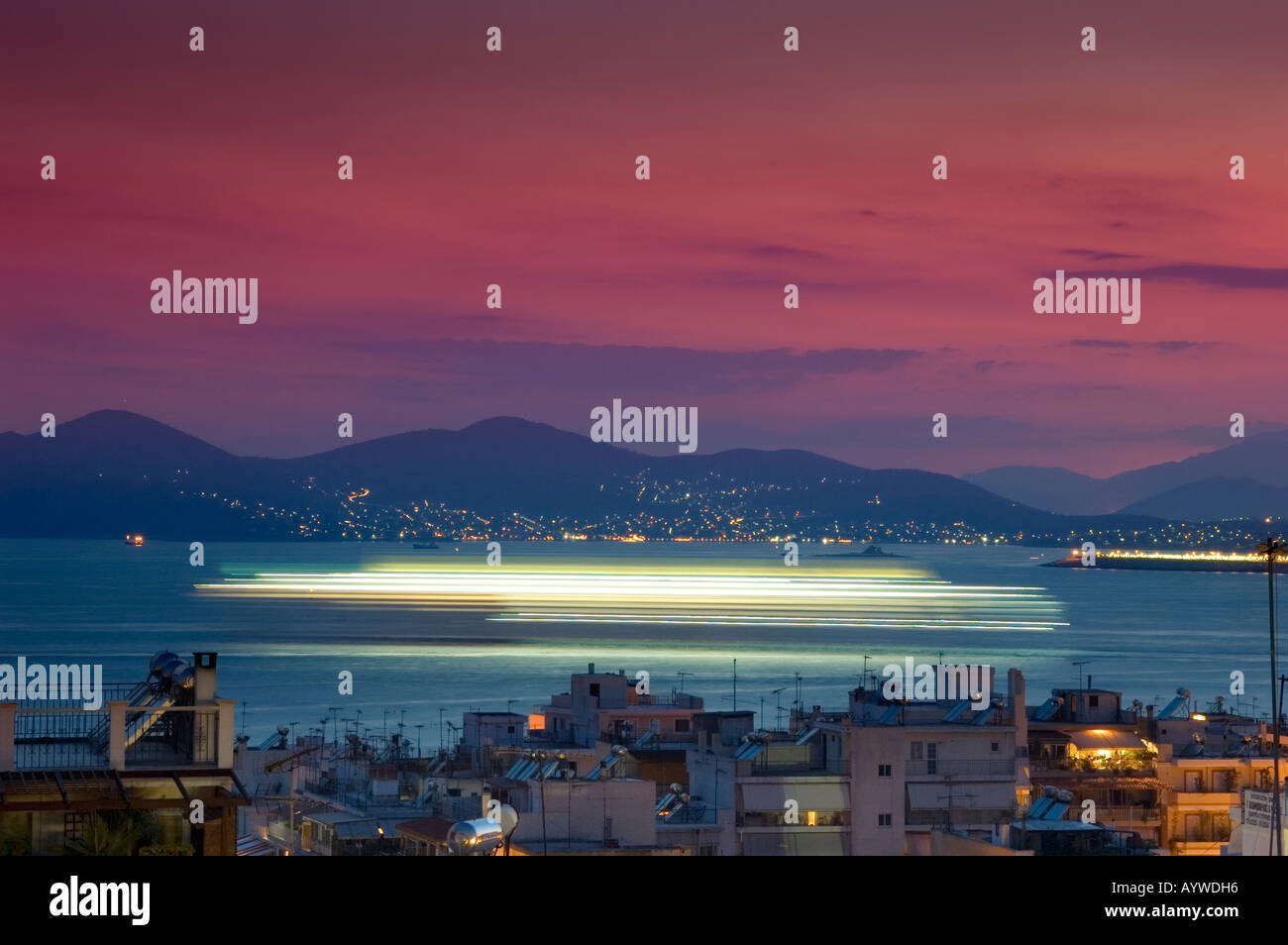 Ferry Leaving Piraeus Port, Sunset, Athens, Greece Stock Photo