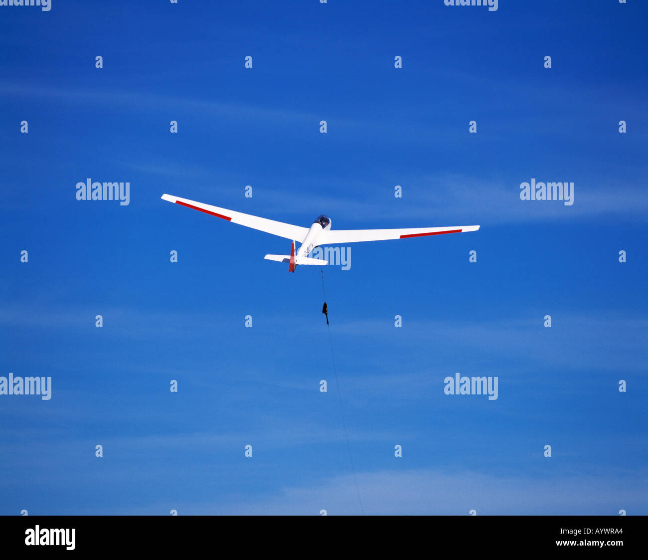 D-Hamm, Ruhr area, North Rhine-Westphalia, gliding field, starting glider, glider will be pulled up to the sky by cable, aeroplane on the sky, starting aeroplane, start, sports plane, two-seater, gliding, glider, glider flight, air traffic, blue sky, airp Stock Photo