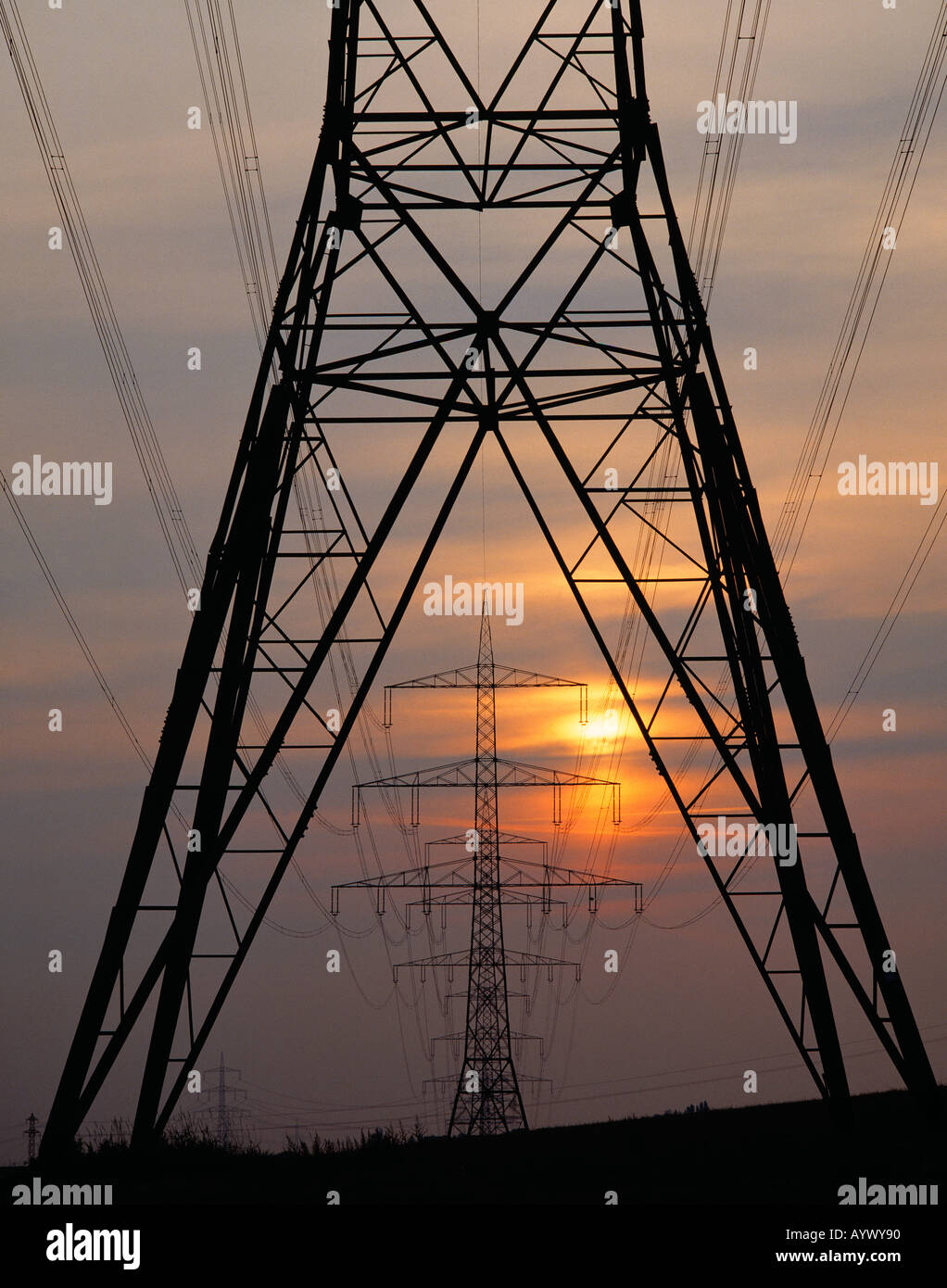 Germany, mains, high tension, high voltage pylon, electricity pylon, power lines, grid pylon, circuit line, current collector, power plant, power station, current, electricity, energy, power generation, electricity generation, evening mood, red coloured s Stock Photo