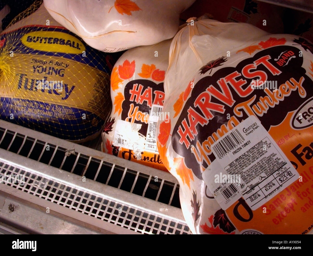 Frozen turkeys of various brands on sale in a supermarket freezer Richard B Levine Stock Photo