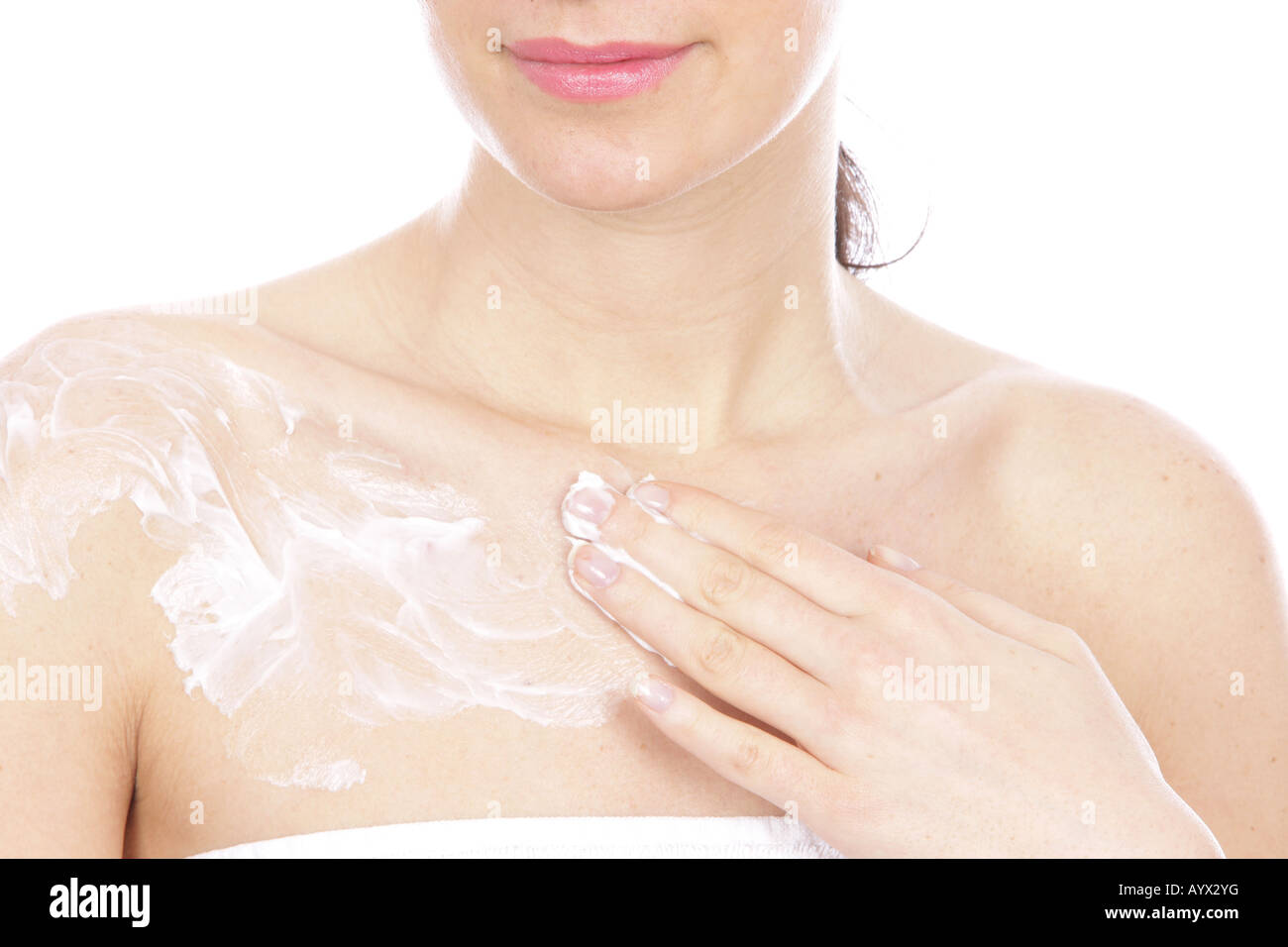 Young Woman Applying Body Cream Model Released Stock Photo