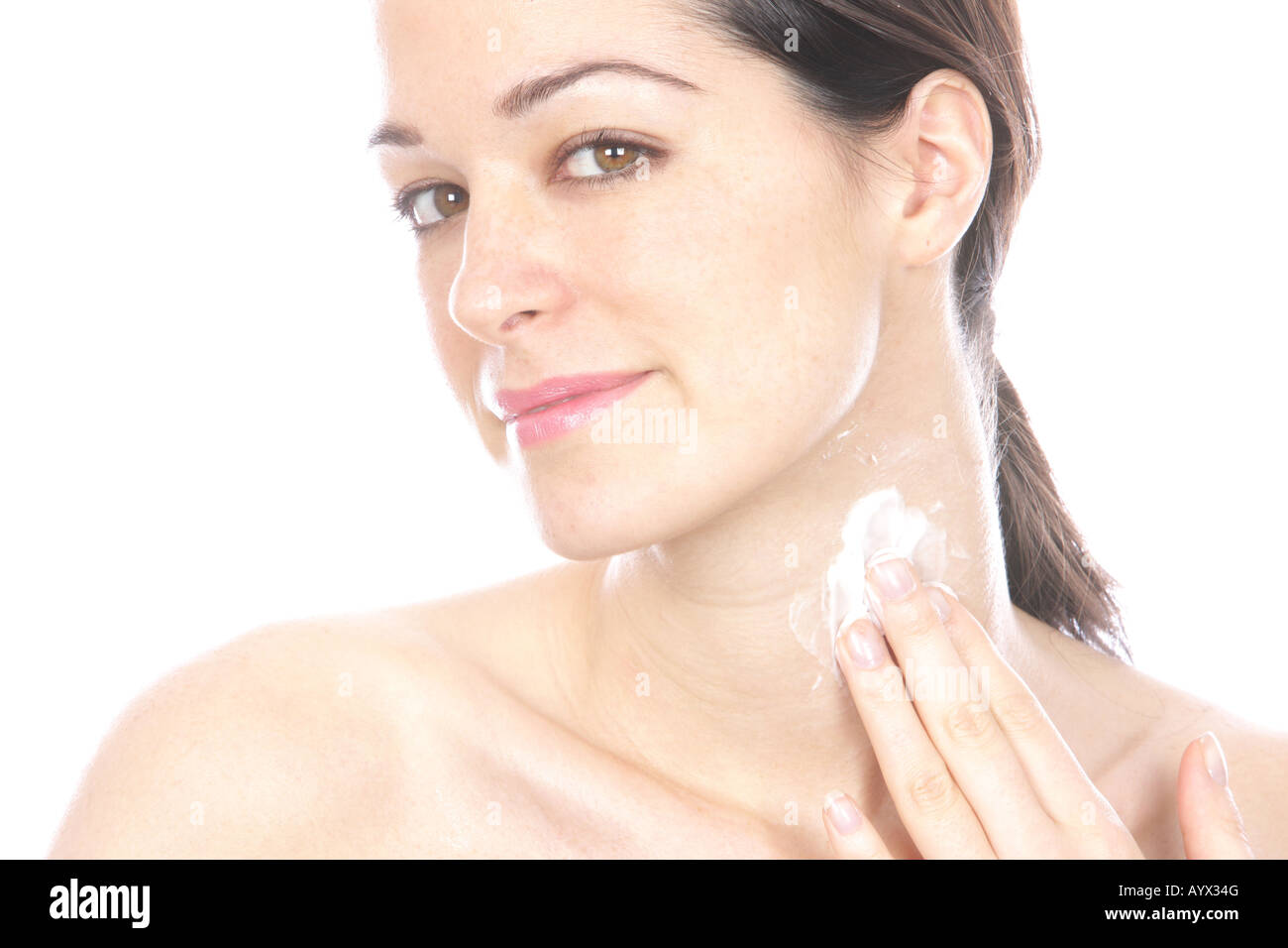 Young Woman Applying Body Cream Model Released Stock Photo Alamy
