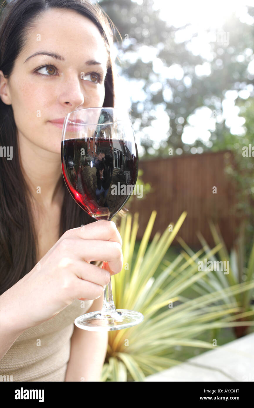 Young Woman Drinking Red Wine Model Released Stock Photo - Alamy