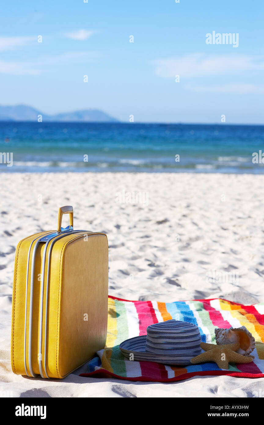 towel and bag on the sand beach Stock Photo - Alamy