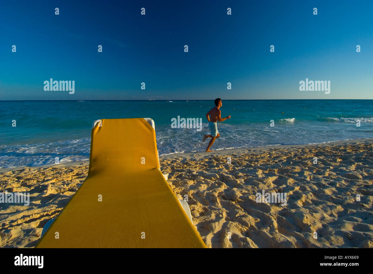 Yellow beach chair Caribbean Stock Photo Alamy