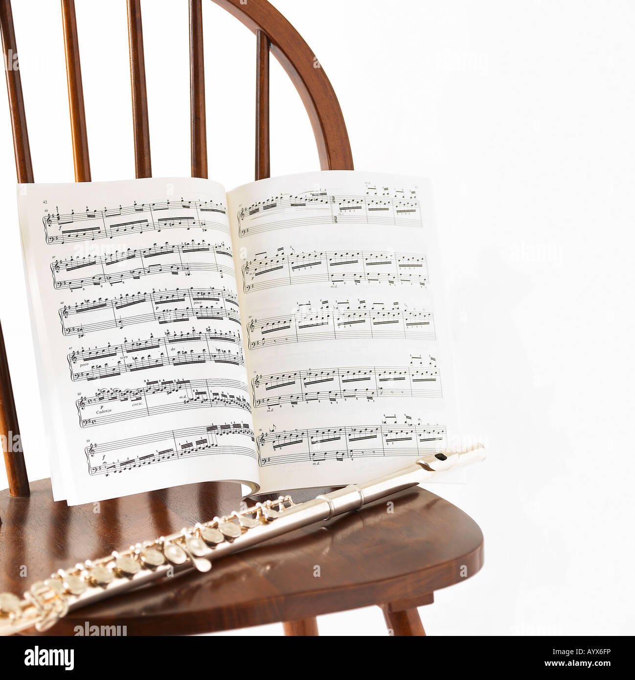 musical score and flute on the chair Stock Photo Alamy