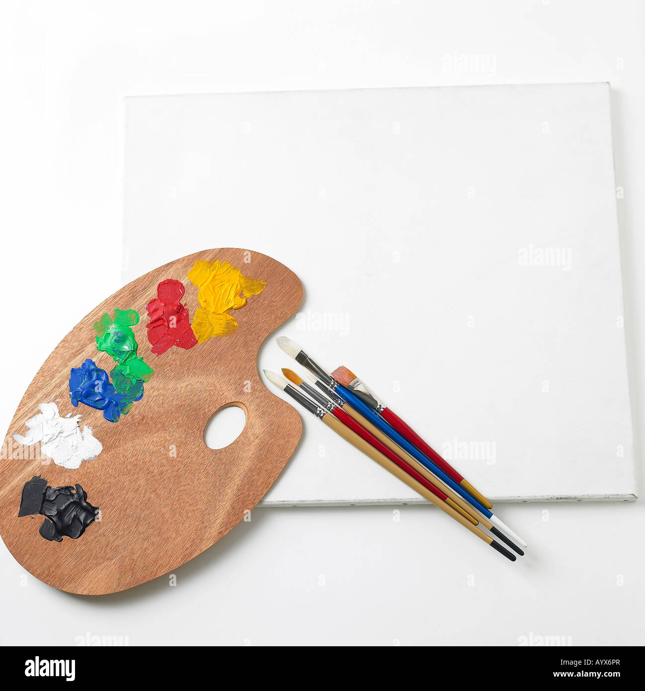 palette and brush on the white sketchbook Stock Photo Alamy