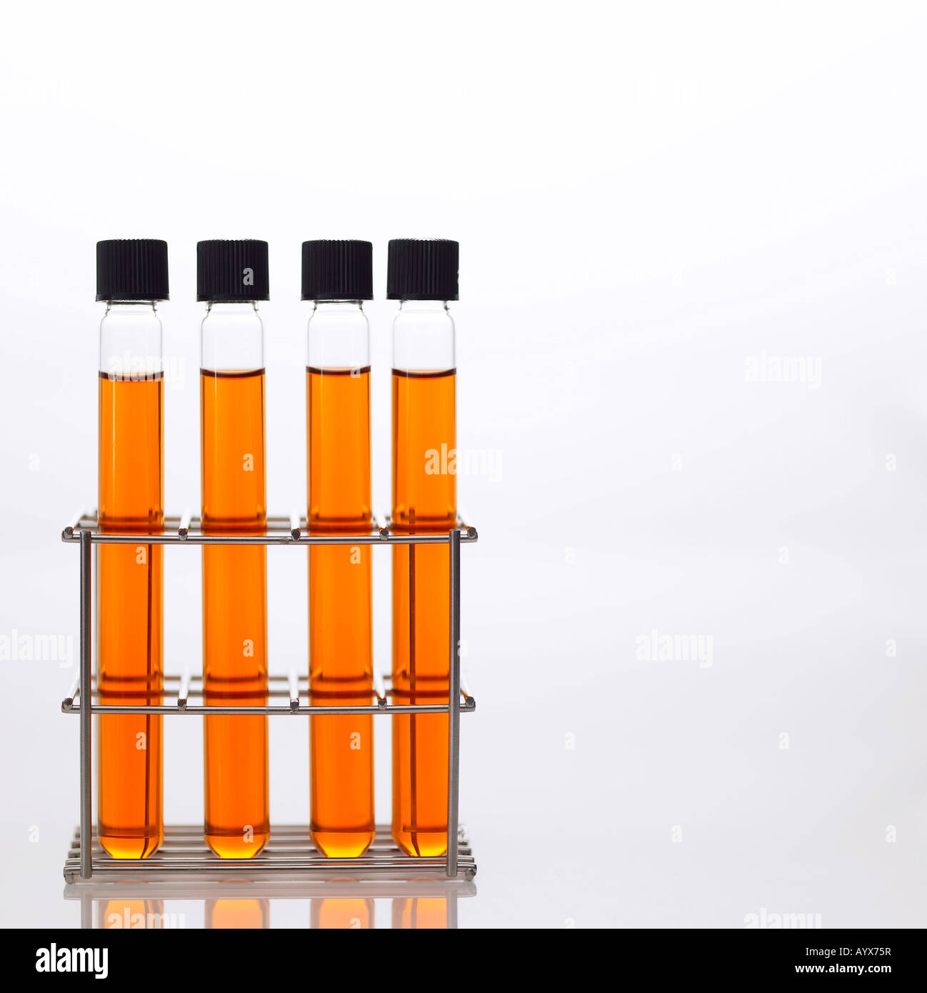 test tube with orange color fluid Stock Photo Alamy