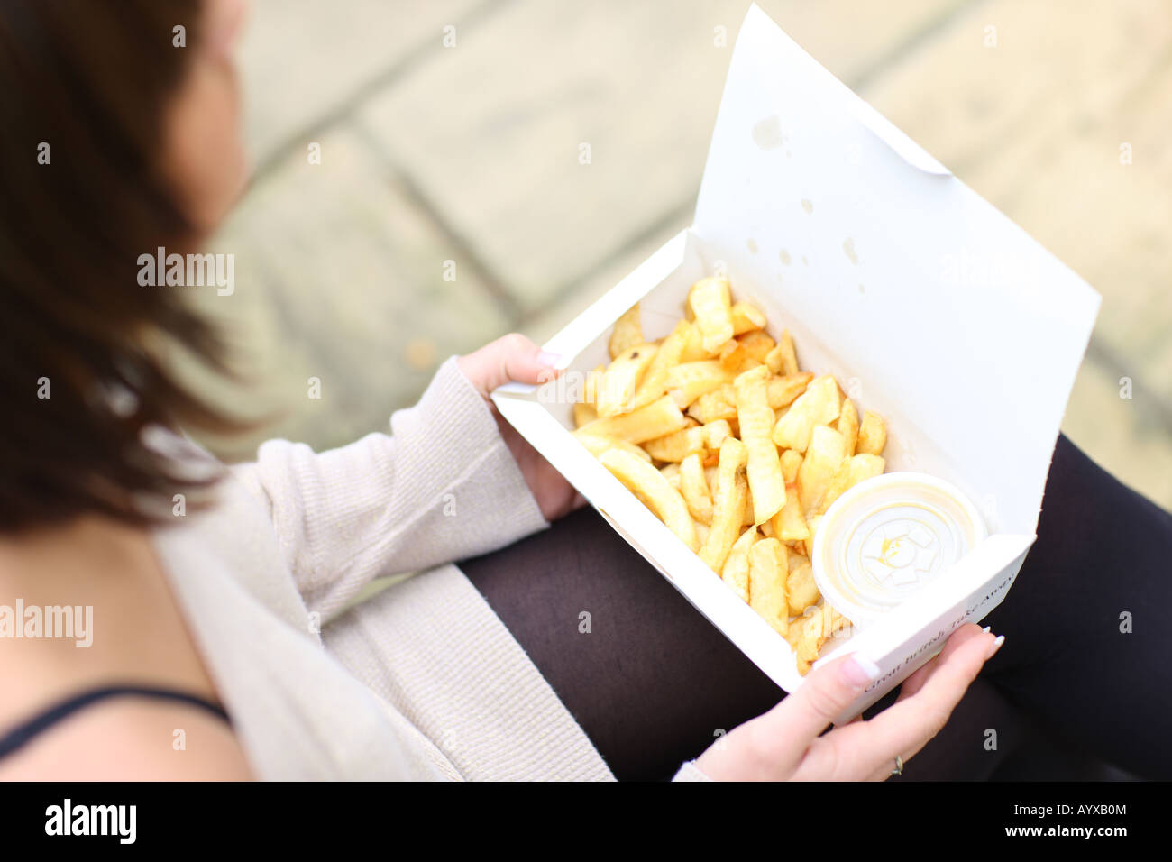 Teenage Girl Eating Chips Model Released Stock Photo Alamy