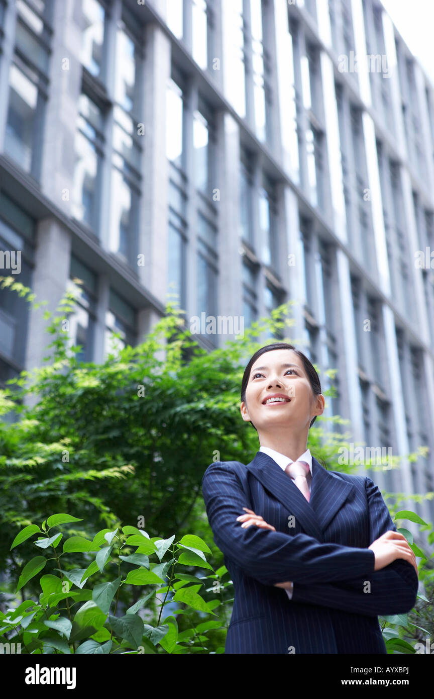 a woman folding her arms Stock Photo - Alamy