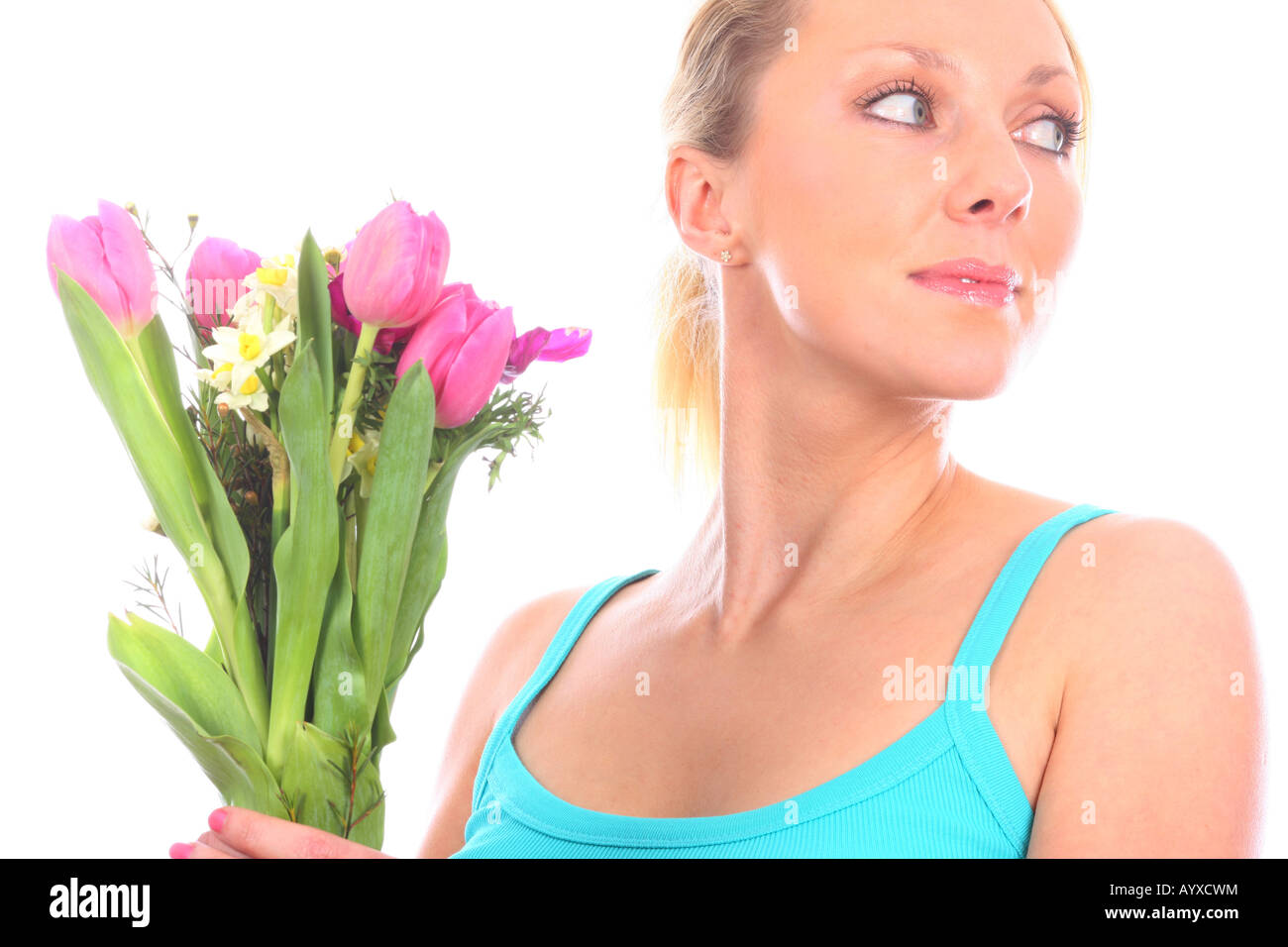 Young Woman Holding Bunch of Flowers Model Released Stock Photo - Alamy