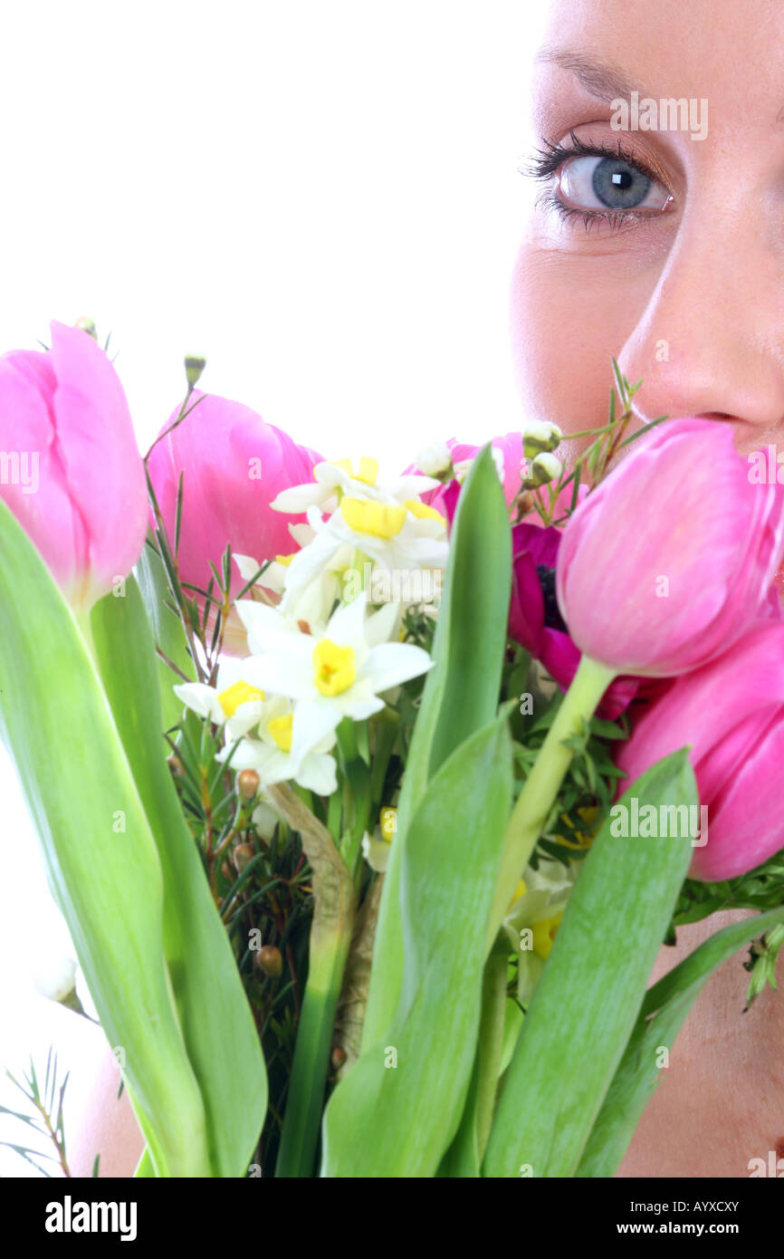 Young Woman Smelling Bunch of Flowers Model Released Stock Photo - Alamy