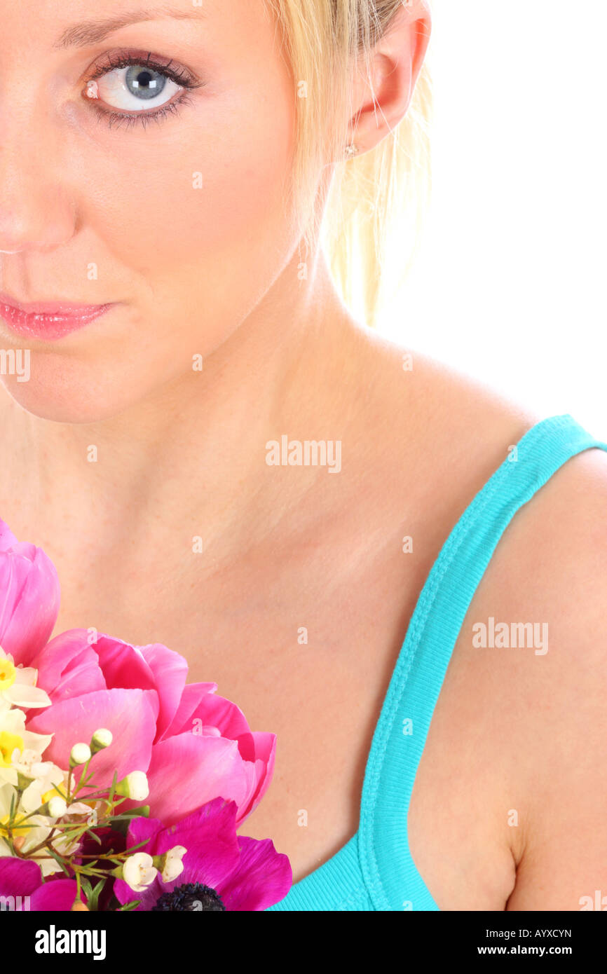 Young Woman Holding Bunch of Flowers Model Released Stock Photo - Alamy