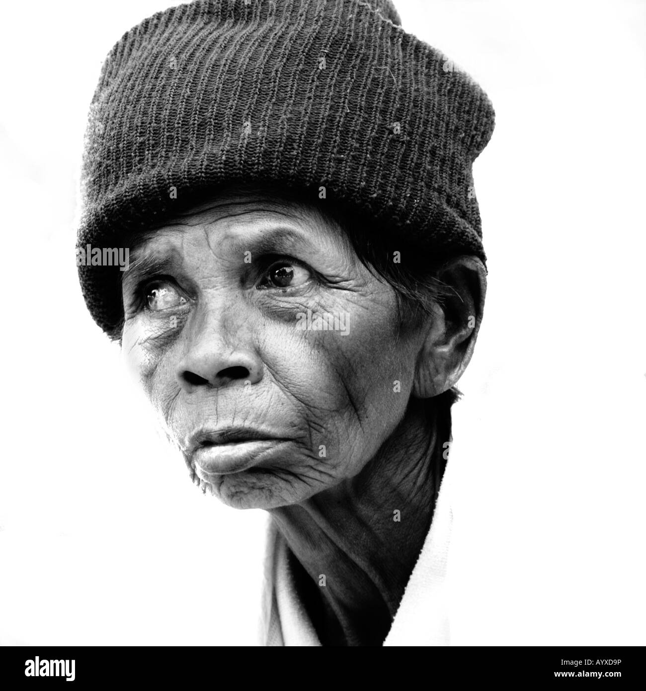 A portrait of a homeless Thai woman. This is a street portrait taken near Bangkok Thailand. Stock Photo