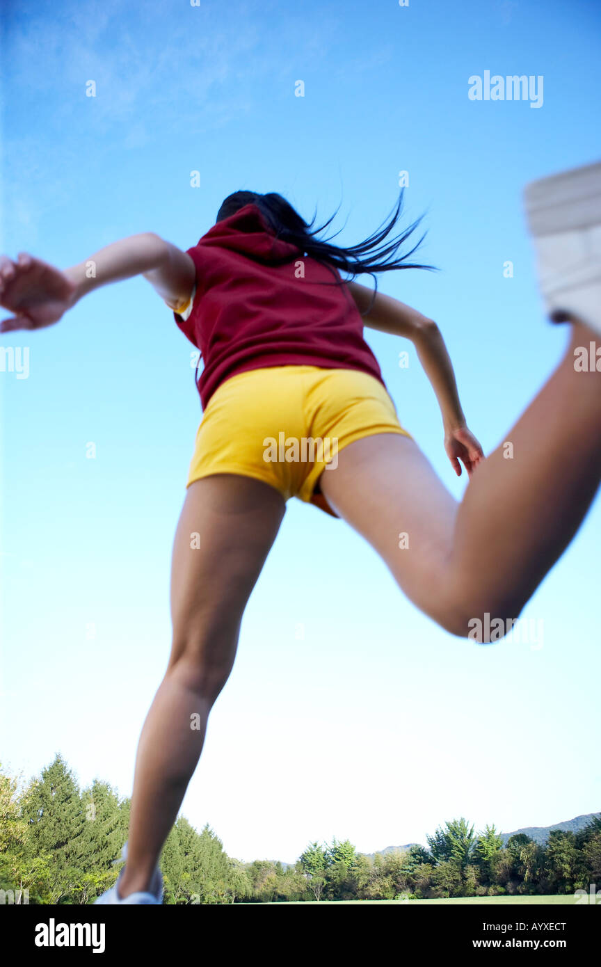 woman's back view running Stock Photo