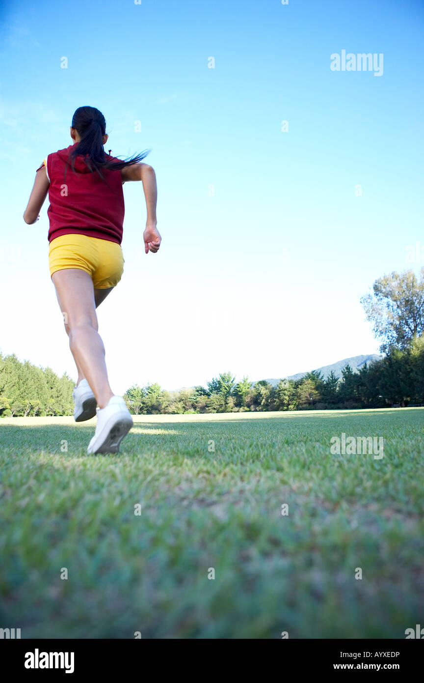 woman's back view running Stock Photo