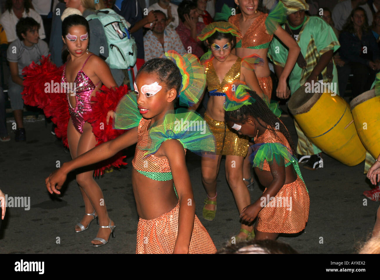 Young girls dancing during the Desfile de llamadas in carnival in the street of Montevideo Uruguay Stock Photo