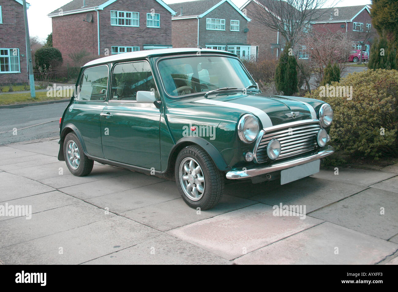 Classic British Racing green Mini Cooper 1997 model with 1275 ccs fuel injected engine Stock Photo