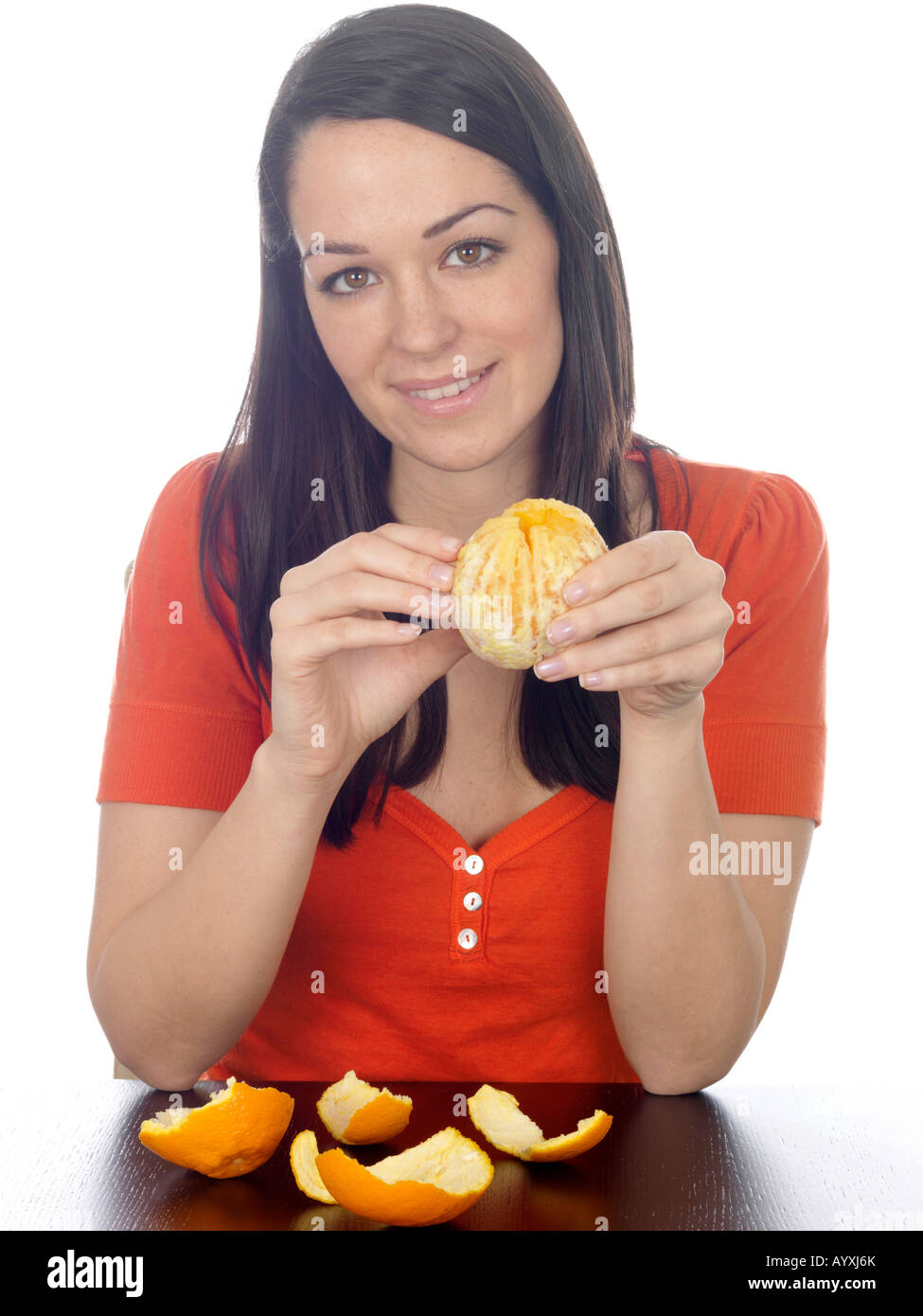 Young Woman Peeling an Orange Model Released Stock Photo - Alamy