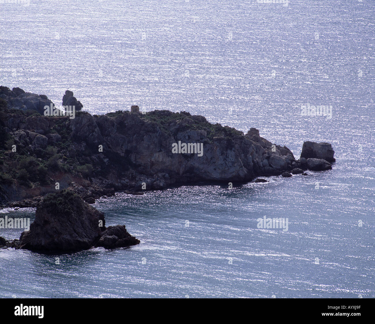 Kuestenlandschaft, Felsenkueste, Landzunge, Felsgestein ragt aus dem Meer, Wellen, Costa del Sol, Andalusien Stock Photo