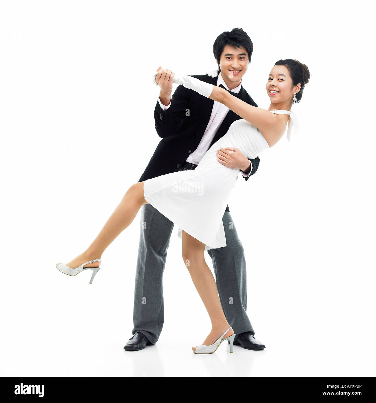 a couple in suit and dress dancing together Stock Photo Alamy