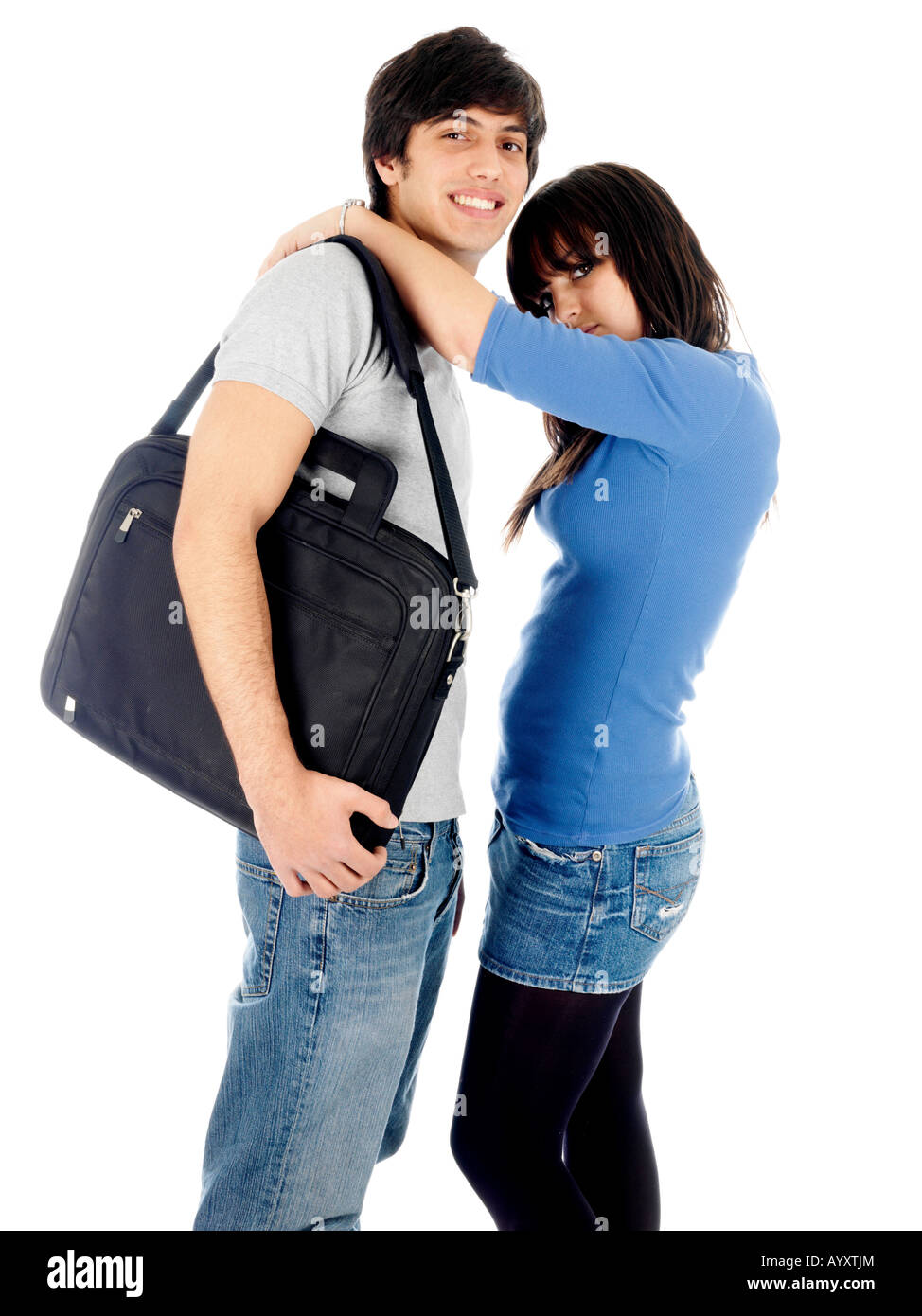 Young Teenage Student Couple Boy And Girl In A Serious College Relationship Isolated Against A White Background With A Clipping Path Stock Photo