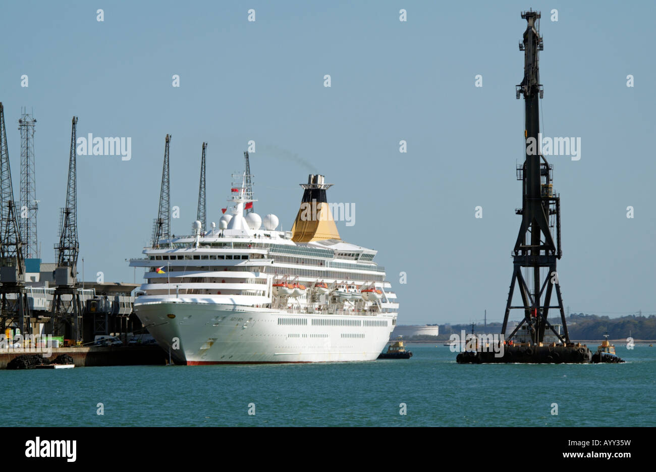 HLV Canute Floating Crane Barge Passing Artemis Cruise Ship Southampton Port England UK Stock Photo