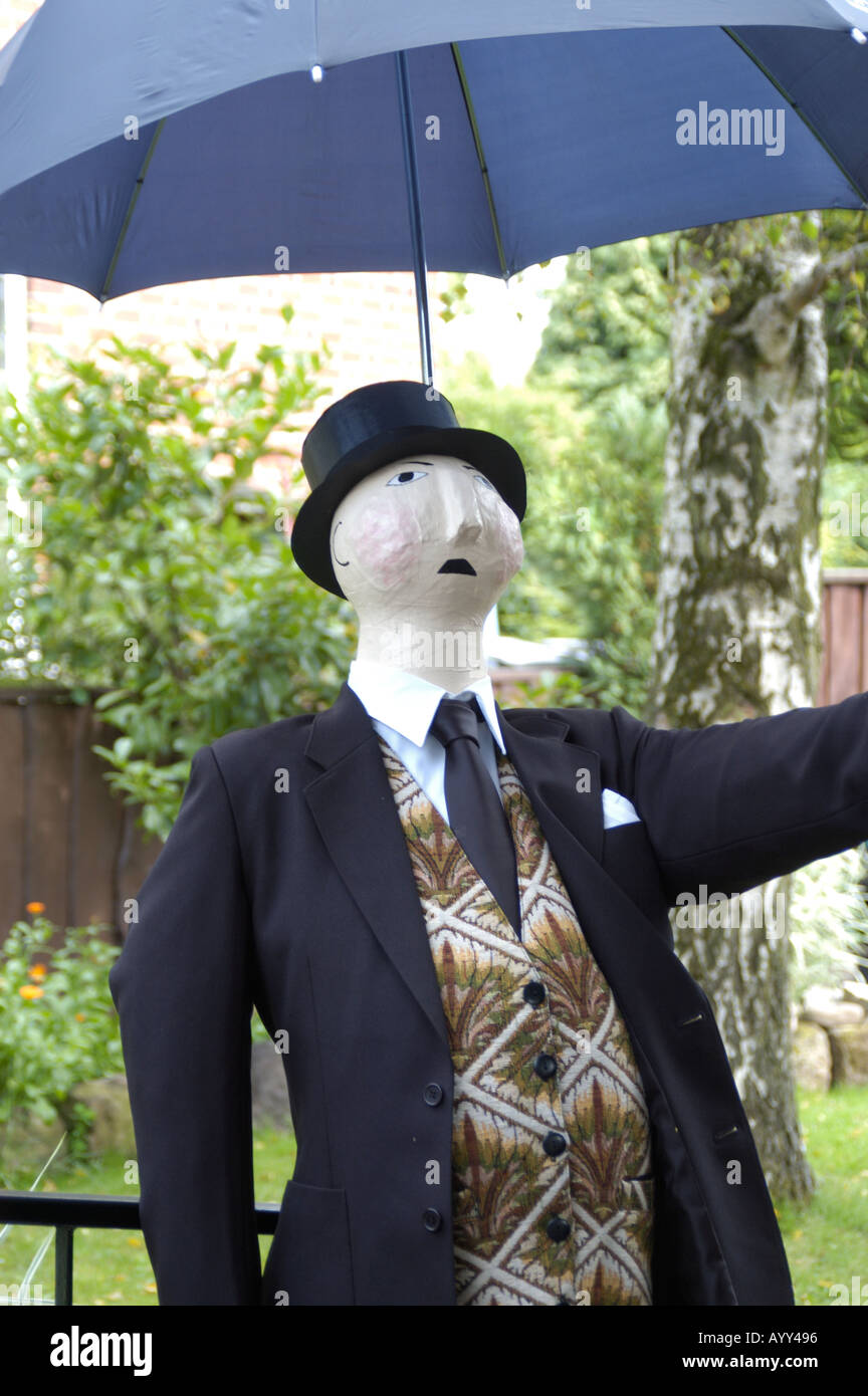 Scarecrow looking like The Fat Controller Stock Photo - Alamy