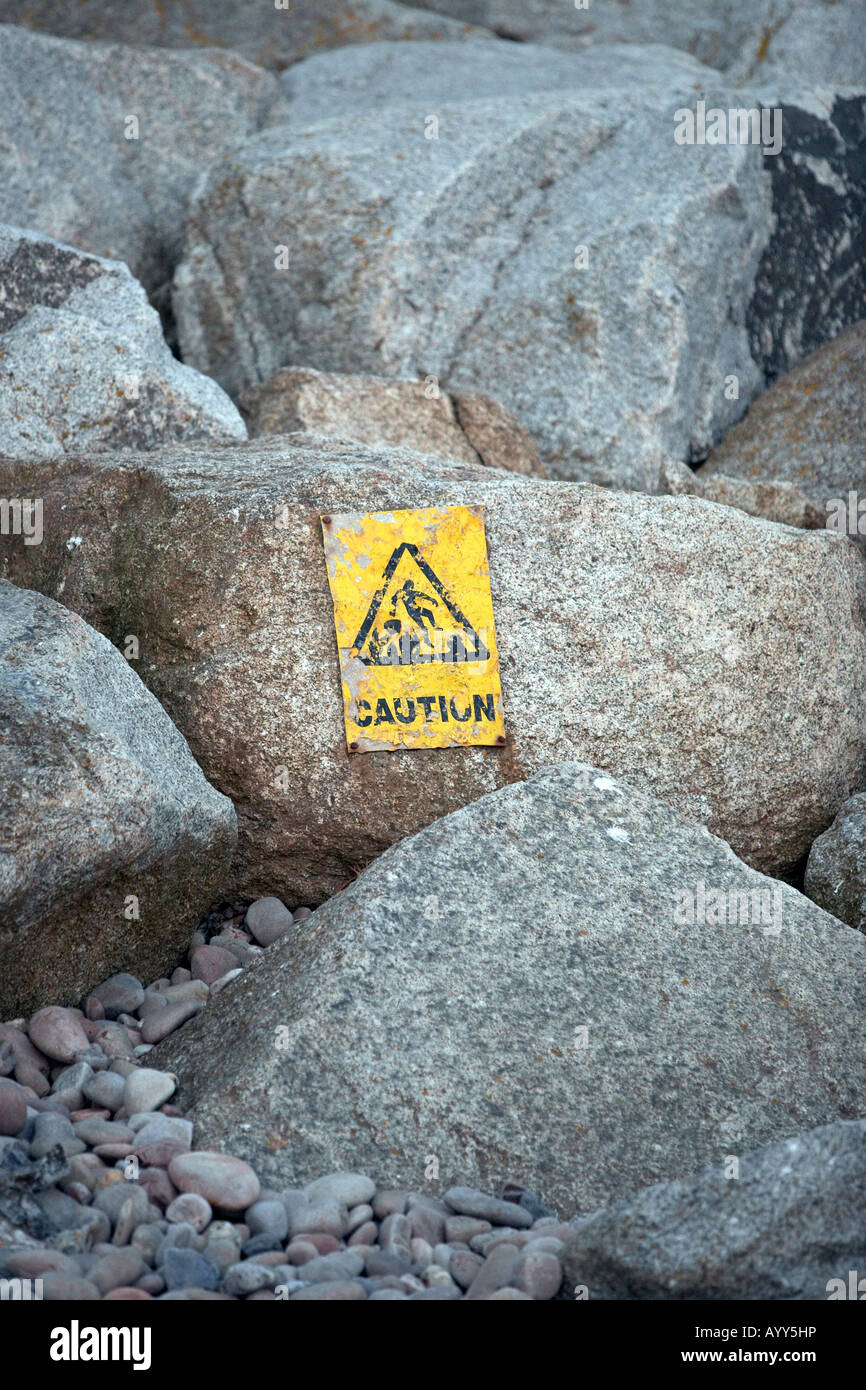 Warning sign of Rocks falling Stock Photo - Alamy