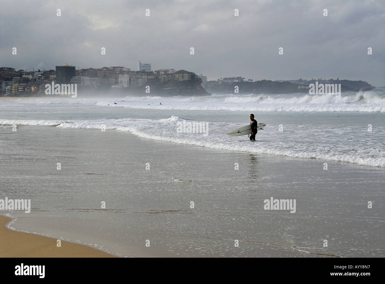 surfer on manly beach sydney Stock Photo