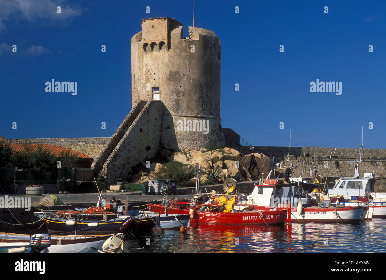 Pisana watchtower 12th century boats in harbor at Marciana Marina Island Elba Italy Stock Photo