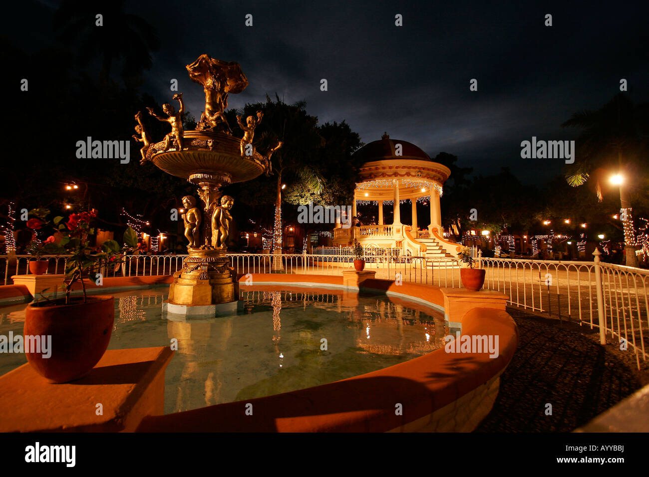 fountain at Parque Central in Granada Nicaragua at night Stock Photo