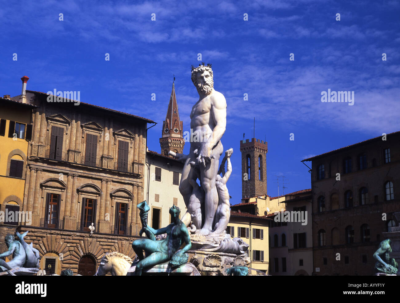 Ammaniati's Neptune statue and fountain Piazza della Signoria Badia Fiorentina and Bargello towers in background Florence Stock Photo