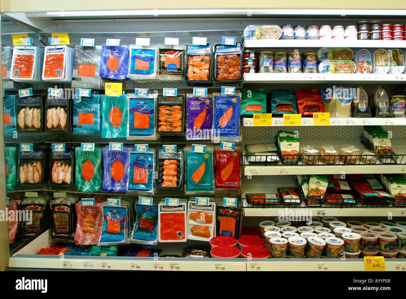 Packaged fish and seafood products in supermarket Stock Photo 3211242