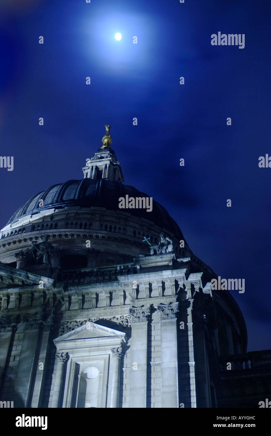 The moon above St Paul's Cathedral Stock Photo