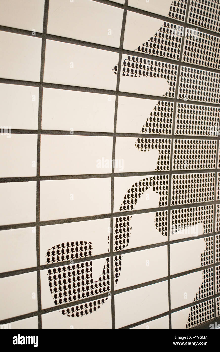 Sherlock Holmes motif decorates the tiles at Baker Street Underground Station London England Stock Photo