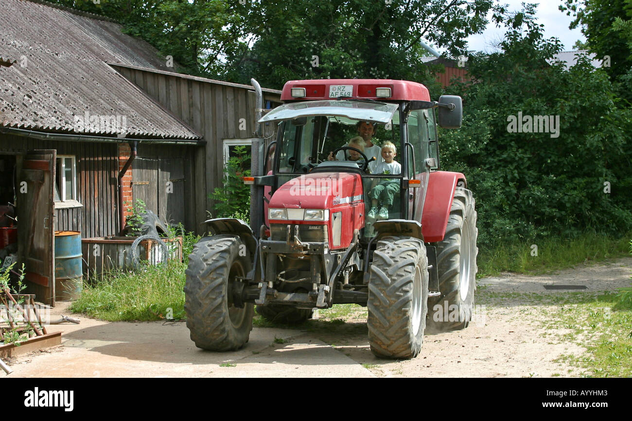 children are allowed to go with tractor Stock Photo