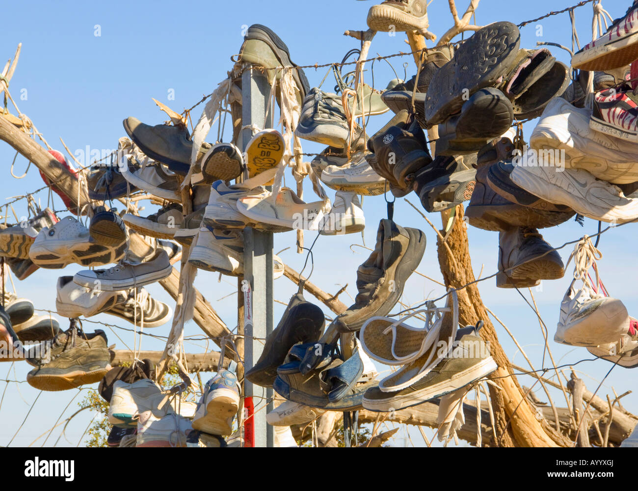 hundreds of shoes on a fence Stock Photo Alamy