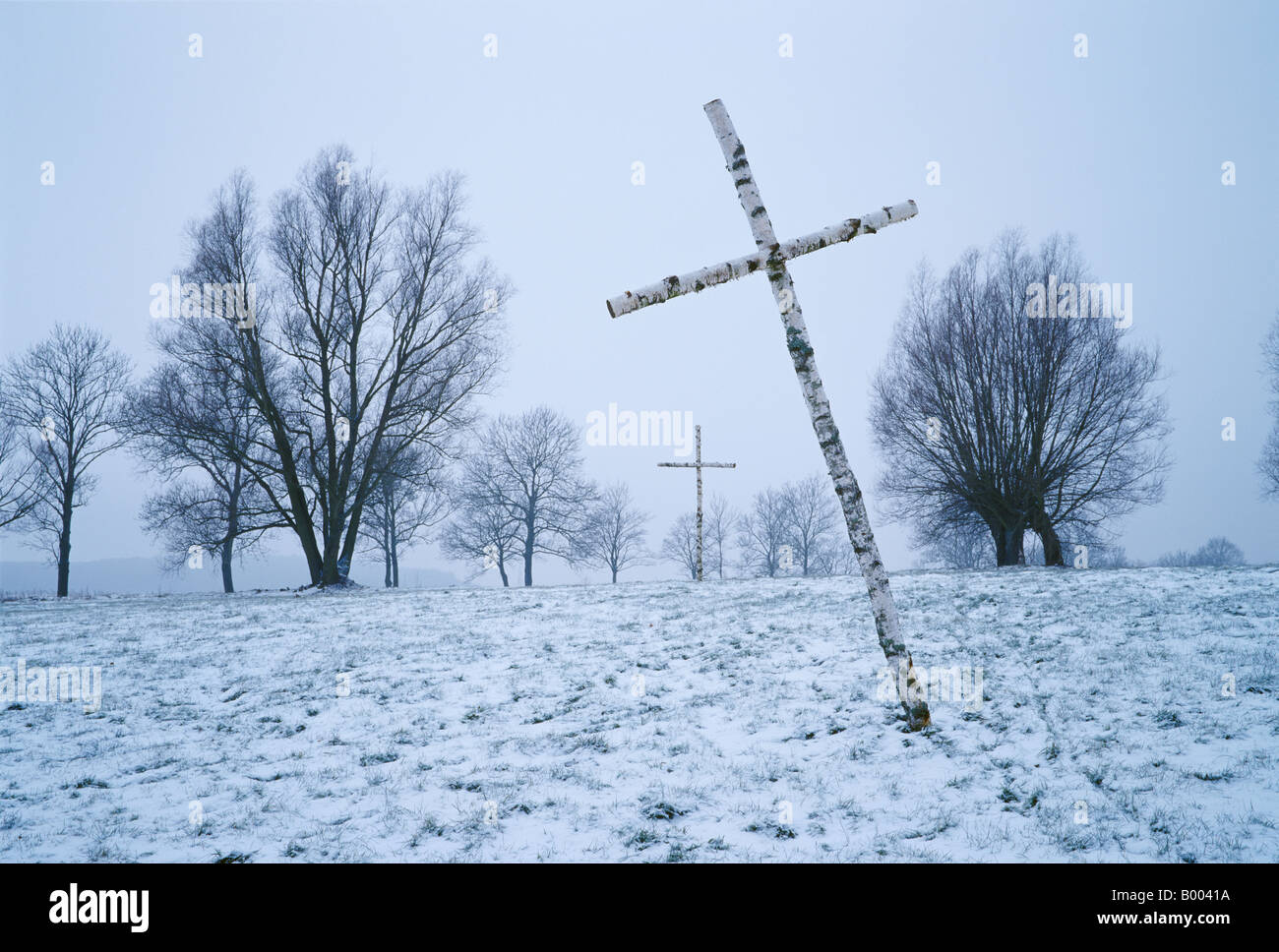 The wooden birch crosses on top of the cementary hill of Gietrzwald mark the planned new 'Way of the Cross'. Stock Photo