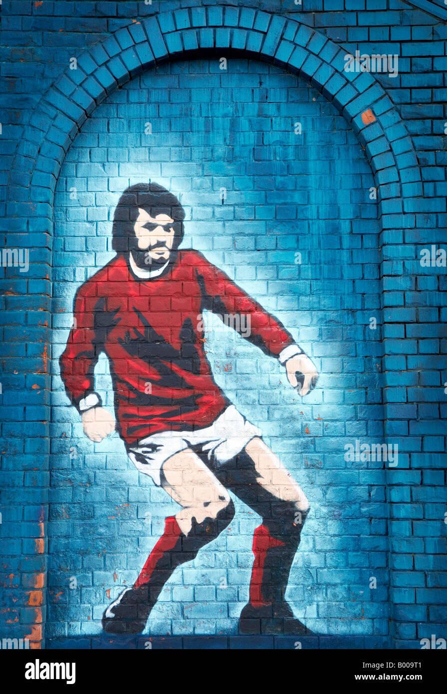 Wall mural celebrating Football legend George Best at Windsor Park football ground Stock Photo