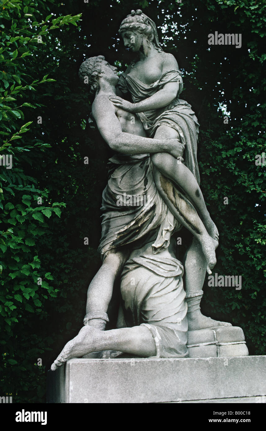 Statury in Vienna is a most absorbing kind, like this statue of a menage a trois seen in park. Stock Photo