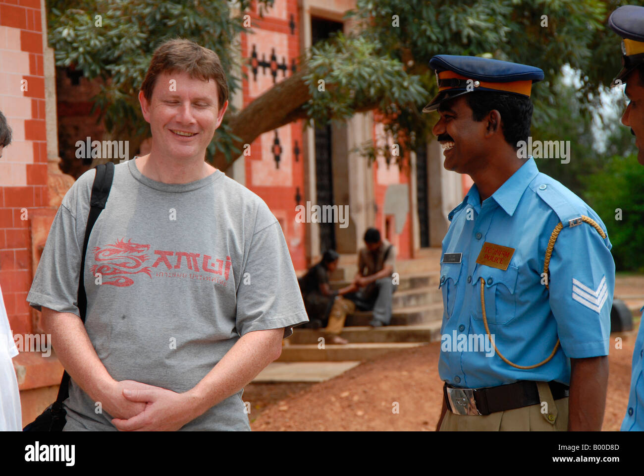 A tourist is interacting with tourism police in Trivandrum,kerala,india Stock Photo