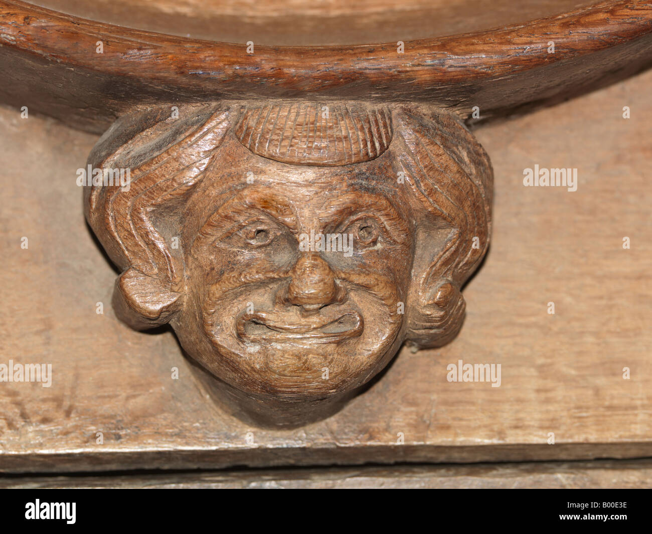 Winchester Cathedral Misericord Detail in the Quireiling Face Stock Photo