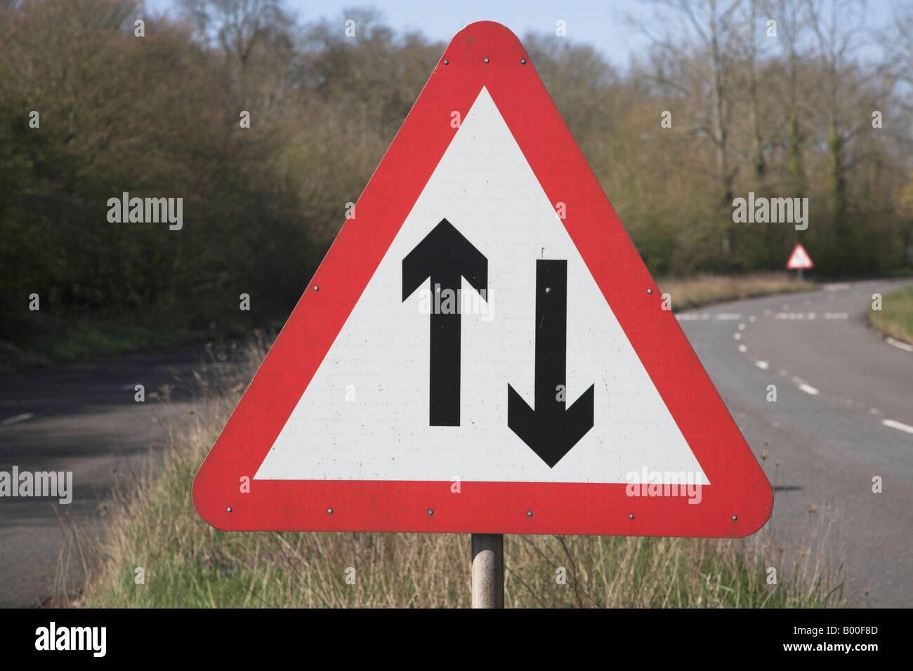 Red triangle sign two way traffic Stock Photo