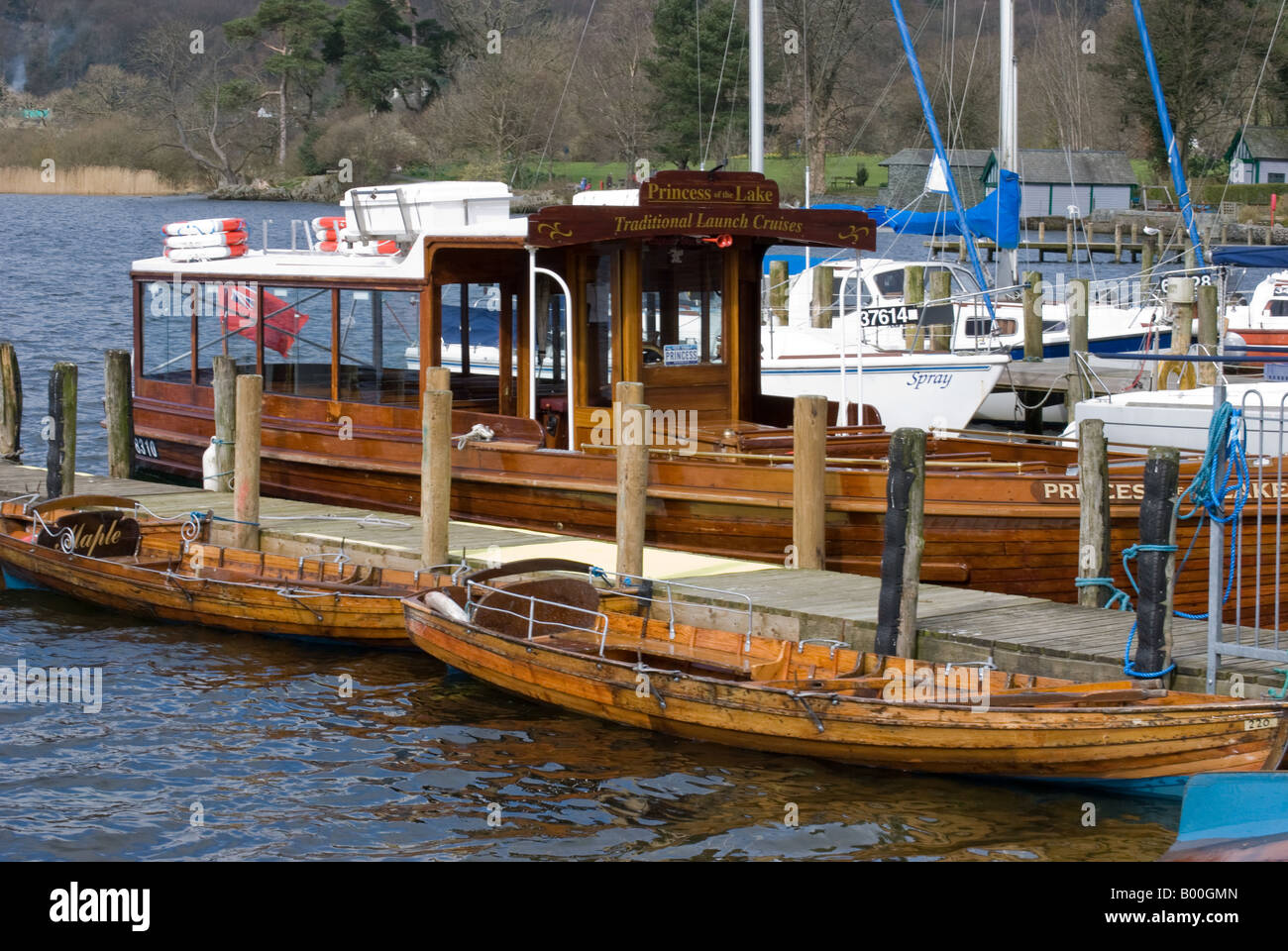 wooden rowing boats and launch at Ambleside Windermere Stock Photo Alamy